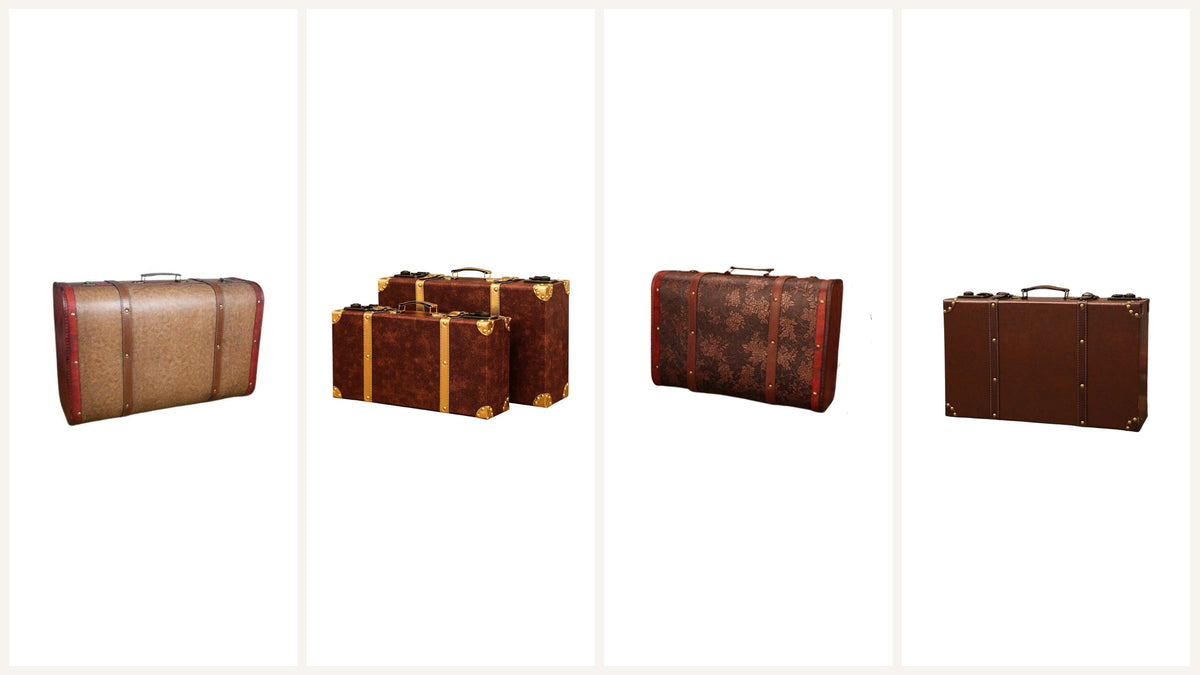 Quatre valises rétro brunes aux finitions lisses, texturées et fleuries Bild