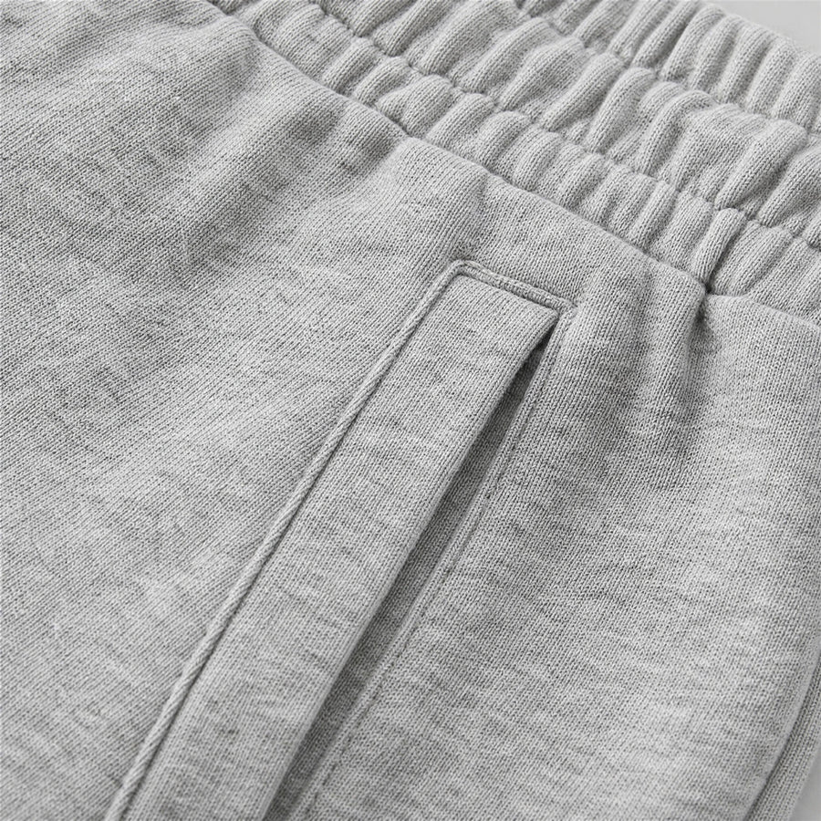 Short de plage ample vintage pour homme - close-up détail matière