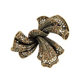 broche-en-alliage-darc-vintage