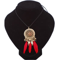 collier-pompon-plume-vintage