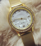 montre-femme-en-maille-doree-vintage