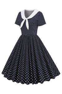 robe-a-pois-noir-et-blanc-annee-80-avec-noeud-papillon